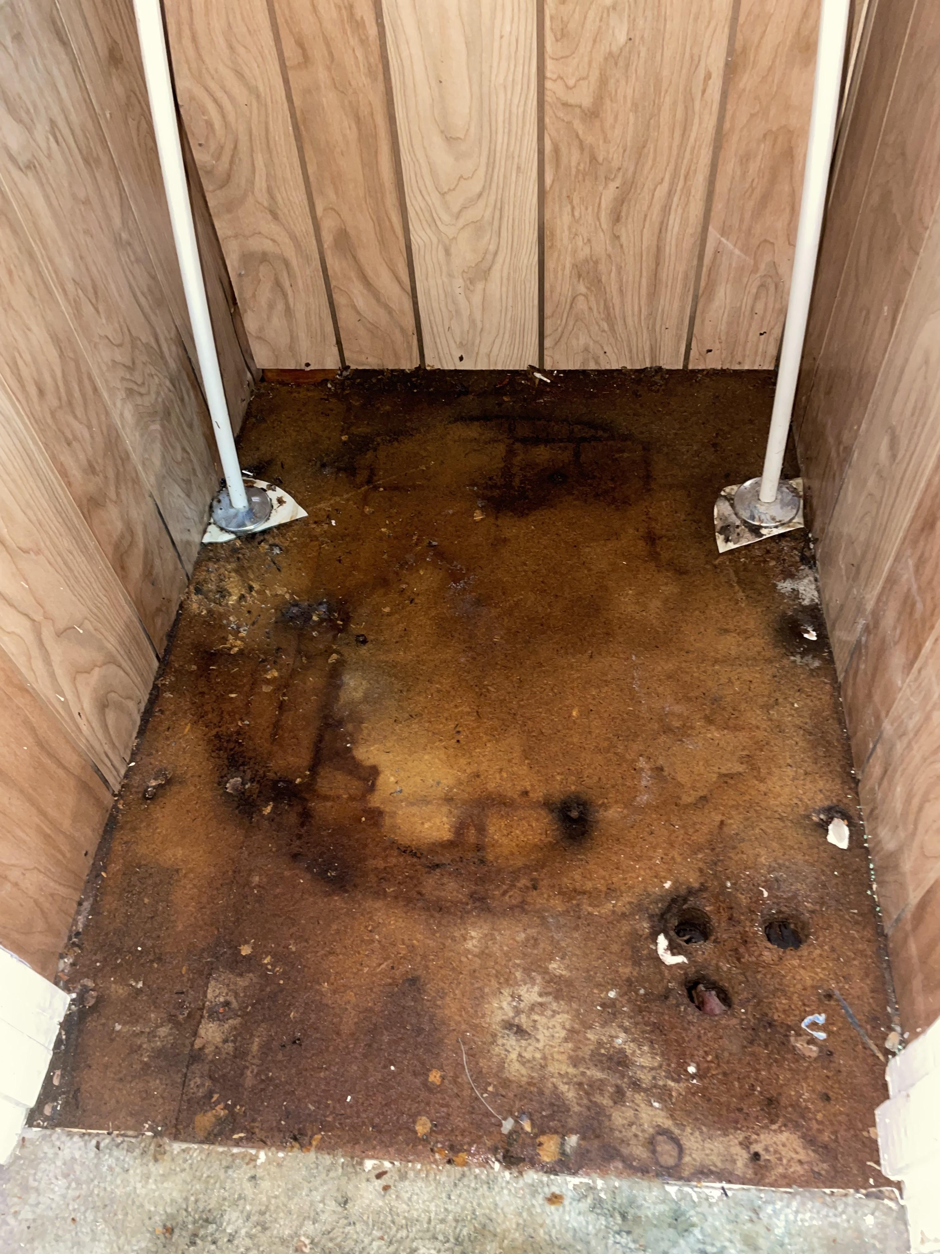Removed flooring where the water heater was