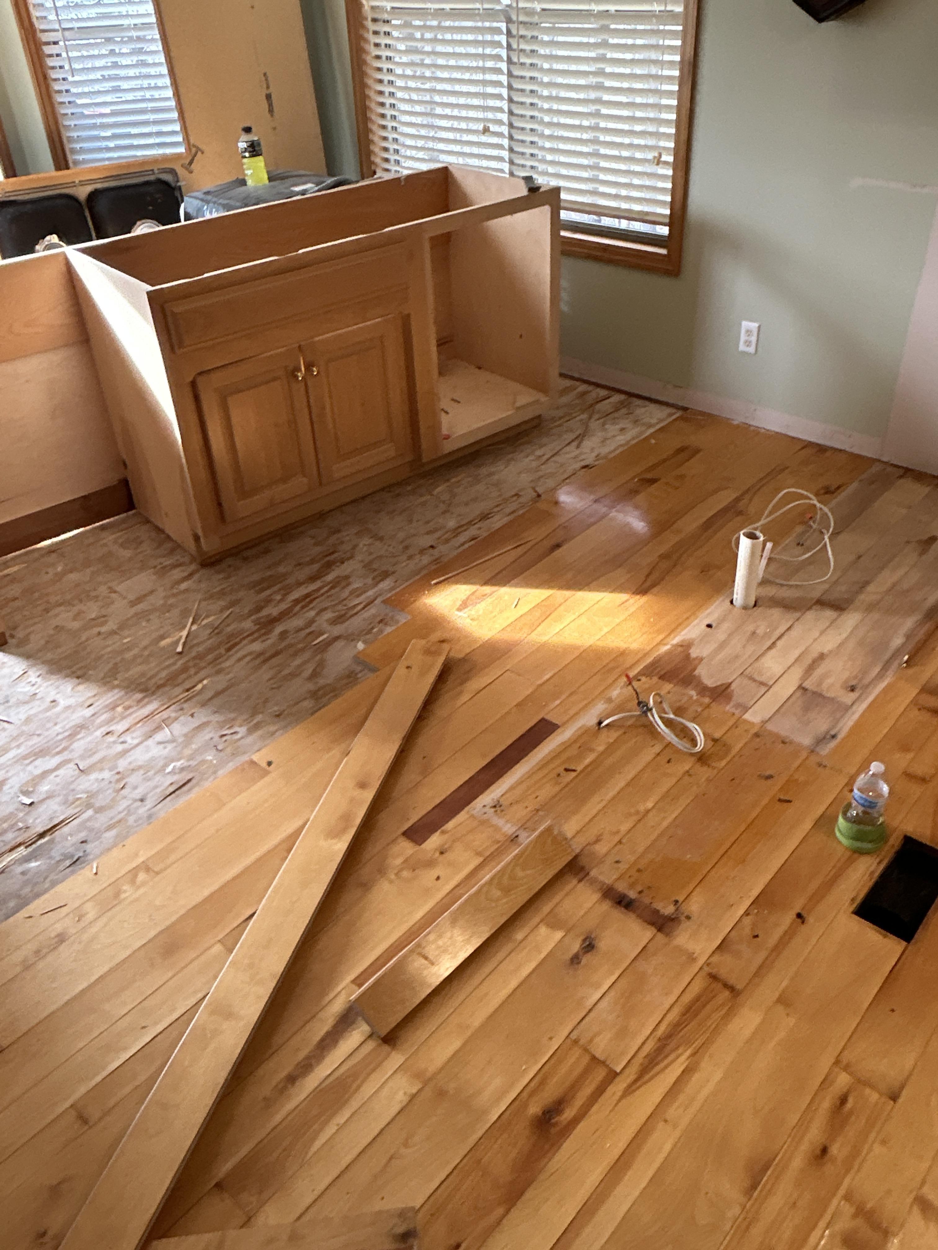 Damaged floor in kitchen