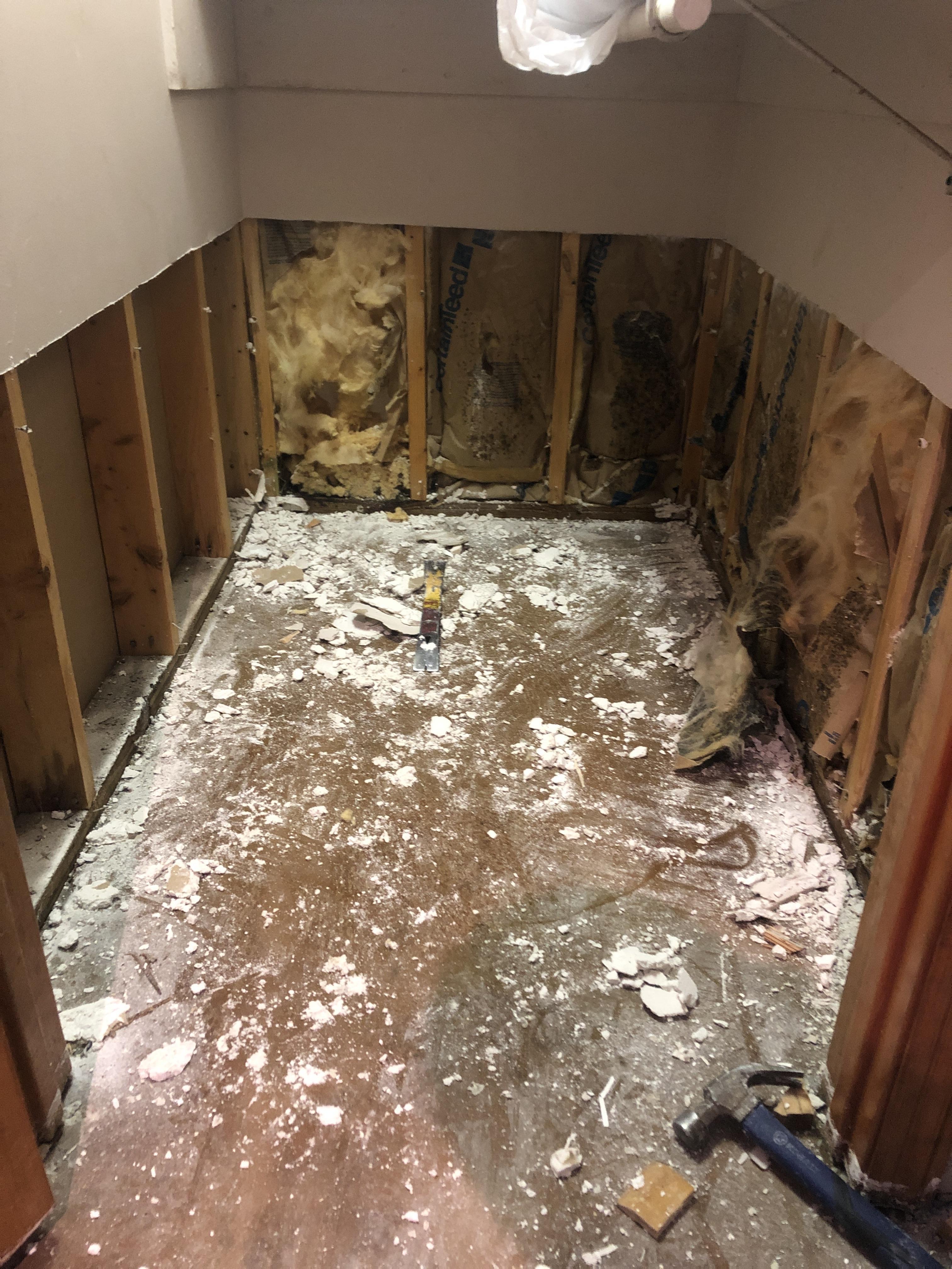 Removed wet, damaged drywall in closet