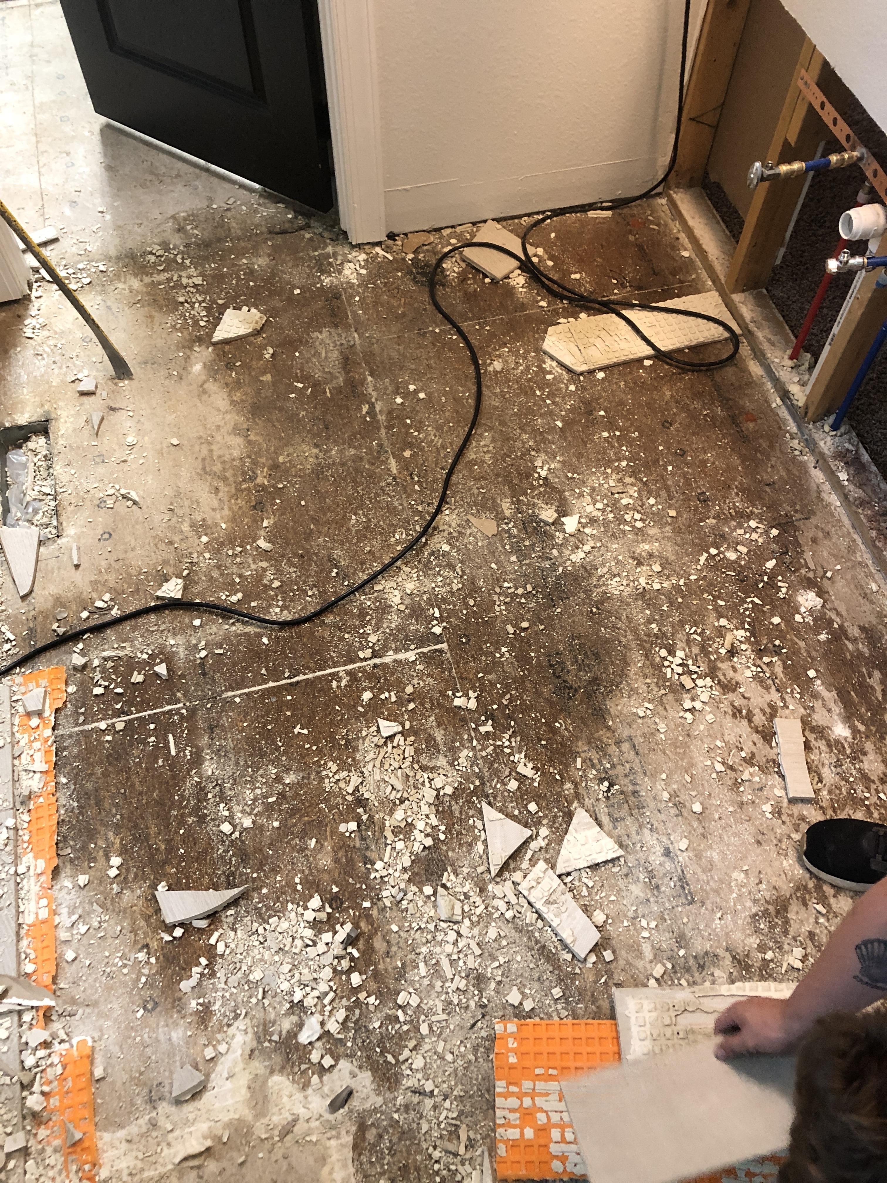 Removed flooring in the bathroom