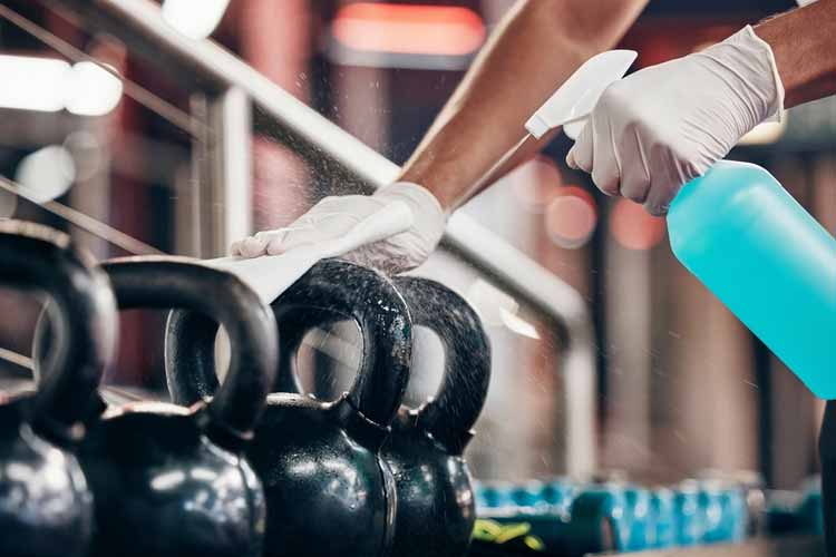 weights being sprayed down